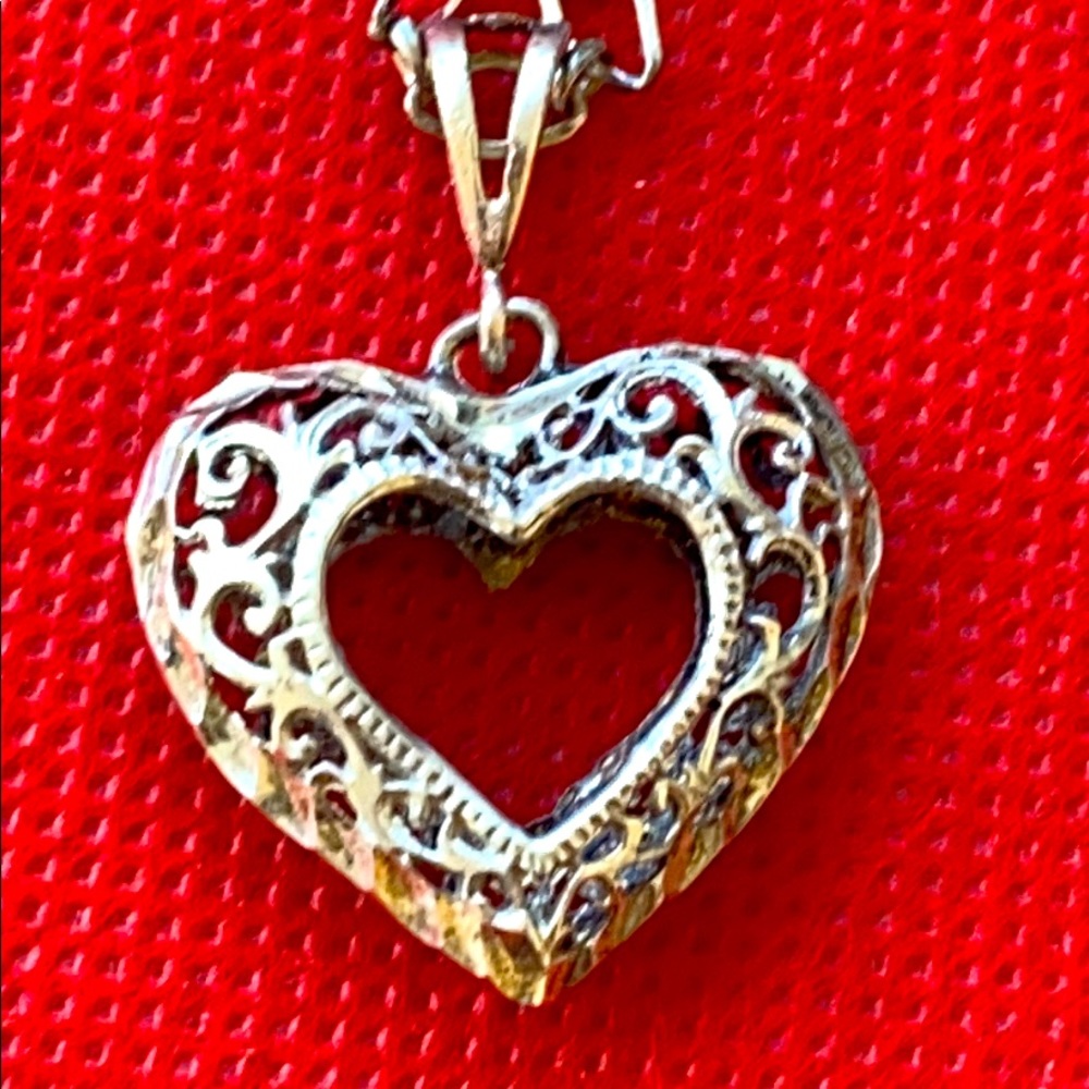 Vintage sterling silver diamond cut heart necklace